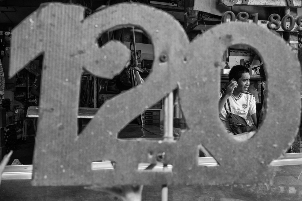 Price tag at a chicken stall at Khlong Thoey Market, Bangkok