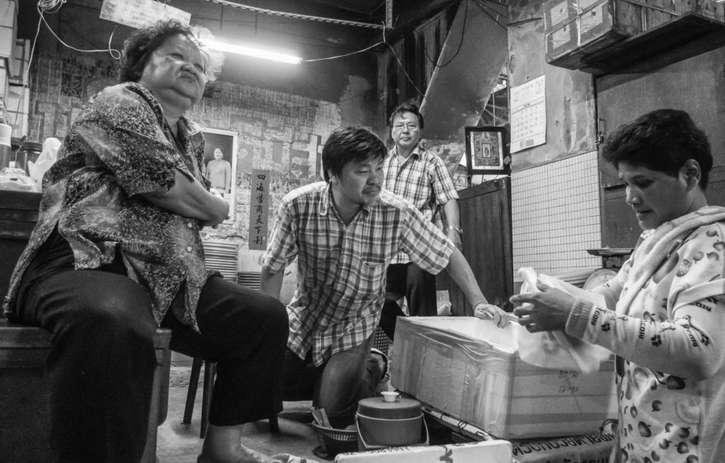 Transaction at Phutharet Market, Bangkok